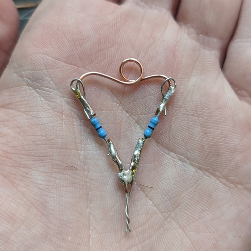 A close-up of the pendant sitting in my palm.